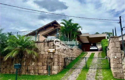 Casa térrea à venda no condomínio marambaia  vinhedo/sp | 3 suítes, piscina, sauna e vista livre!