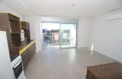 Loft semi mobiliado com sacada ampla e vaga coberta no centro de pelotas - studio residence plus ii