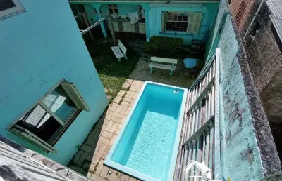 Casa com piscina, sala de jogos, anexo gourmet na praia de cidreira/rs