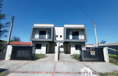 Excelente sobrado geminado apto ao financiamento bancário na praia de cidreira/rs