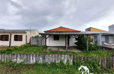 Casa mista na avenida central da praia de cidreira/rs