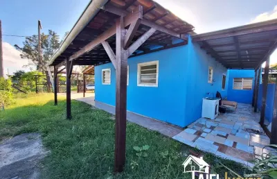 Casa de barbada em rua asfaltada no centro da praia de cidreira/rs
