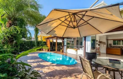 Casa com 3 quartos à venda em jurerê internacional, florianópolis  por r$ 3.990.000
