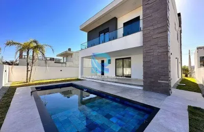 Casa com 4 dormitórios na primeira quadra do mar na  bellatorres