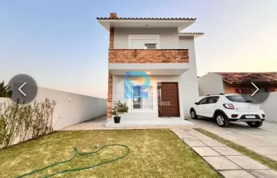 Casa à venda no bairro balneario bellatorres - passo de torres/sc
