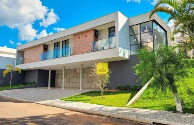 Maravilhosa casa com 4 suítes, 4 vagas e área de lazer no spina ville
