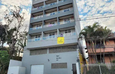 Apto de um quarto e sala com varanda e garagem no aeroporto