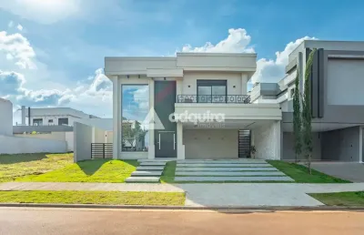 Casa à venda no condomínio alphaville, contendo 3 suítes.