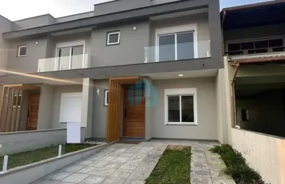Belo sobrado novo, no residencial golfinho, localizado no centro de garopaba!