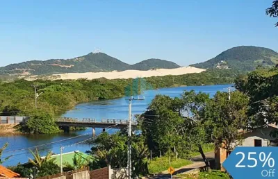 Casa com linda vista p/ mar, lagoa e dunas, no bairro siriú, em garopaba!