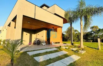 Linda casa localizada no condomínio rosa internacional, na praia do rosa!