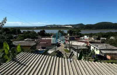 Casa com vista exuberante p/ lagoa, costa de macacu | garopaba - sc
