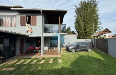 Bela casa com amplo pátio e piscina, próxima de todo comércio e poucos minutos das principais praias, campo duna | garopaba - sc