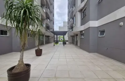 Apartamento 2 dormitórios mobiliado em barreiros com vista para o mar.
