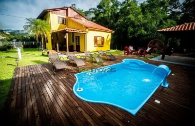 Chácara à venda em aguas mornas-sc, bairro teresópolis com 3 quartos, 1 suíte, 1 sala, 2 banheiros.