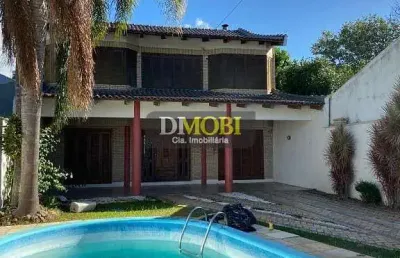 Sobrado com 3 dormitórios para alugar, 250 m² por r$ 6.750,00/mês - dom feliciano - gravataí/rs