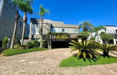 Sobrado com 3 dormitórios para alugar, 393 m² por r$ 25.428,52/mês - alphaville - gravataí/rs