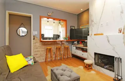 Apartamento de 2 dormitórios com lareira no bairro menino deus a metros do shopping praia de belas