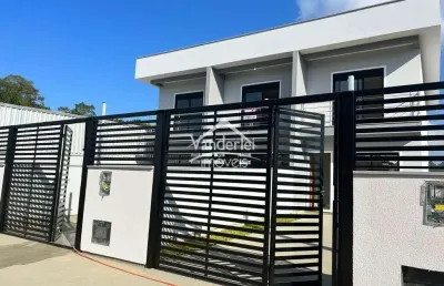 Sobrado no loteamento shutz com 02 quartos, sendo 01 suíte no bairro aririu em palhoça - sc