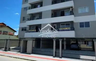 Apartamento 3 dormitórios sendo uma suíte no centro de  palhoça