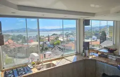 Vista belíssima com por do sol! cobertura à venda no abraão com 4 dorm.
