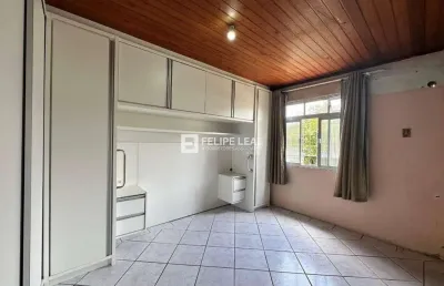 Casa de 03 dormitórios sendo 2 suítes em forquilhinhas , área residencial e comercial perto da geral-  são josé