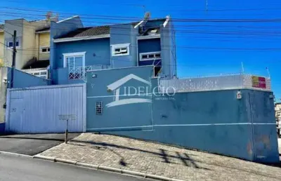 Casa com 3 quartos à venda na rua gabirobas, 32, uberaba, curitiba por r$ 1.090.000