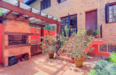 Casa em condomínio fechado com 3 quartos à venda na Rua Jaraguá, 355, Bela Vista, Porto Alegre