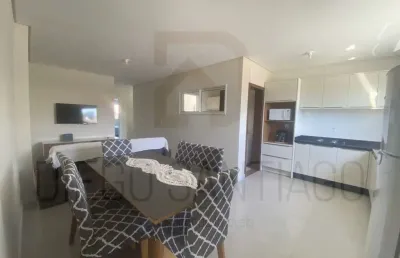 Apartamento de 2 quartos com 1 suíte, 2 salas e vaga de garagem em garopaba-sc: oportunidade de investimento!