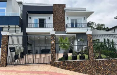 Casa com 4 quartos à venda na rua das cabreúvas, 427, pedra branca, palhoça por r$ 2.300.000