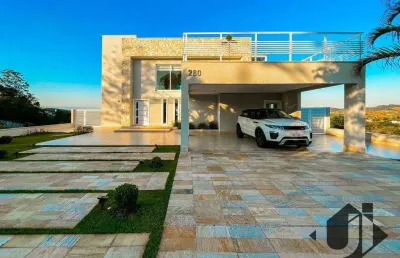 Casa com 4 dormitórios à venda, 628 m² por r$ 4.190.000,00 - condomínio altos do cataguá - taubaté/sp