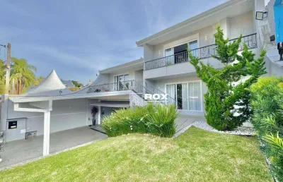 Casa com 4 quartos, porteira fechada, piscina e quintal amplo à venda, 490 m² por r$ 3.799.000 - santo inácio, curitiba/pr