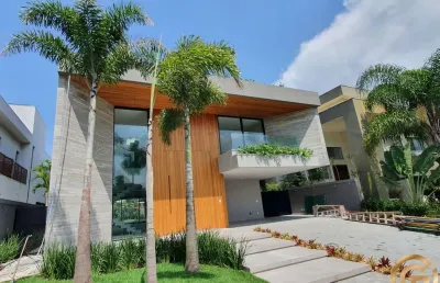 Mansão de 852m², contemporânea, 5 suítes, triplex, piscina e spa, possibilidade mobiliada, na barra da tijuca.