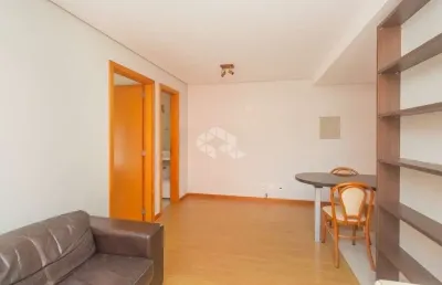 Apartamento de 1 quarto com churrasqueira e garagem