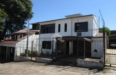 Casa com 3 quartos à venda na Avenida Valado, 158, Vila João Pessoa, Porto Alegre