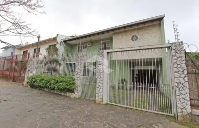 Casa com 5 quartos à venda na Rua Guilherme Alves, 154, Partenon, Porto Alegre