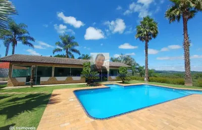Linda chácara de alto padrão completa com lago e piscina em condomínio fech