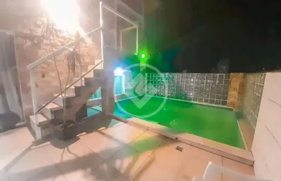 Apartamento com 4 quartos à venda na Rua Colômbia, 618, Jardim Las Palmas, Guarujá