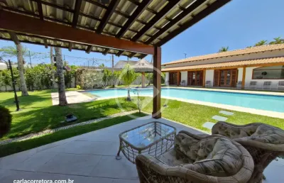Deliciosa casa jardim acapulco térrea e com ampla área de convivência guarujá sp codigo: 112054