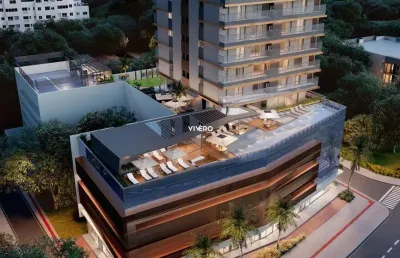 Apartamento com 3 suítes andar alto de frente na praia brava de itajaí
