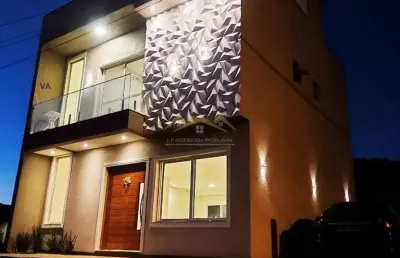 Sobrado luxo com cozinha e ilha sob medida em gravataí