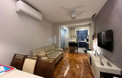 Na tijuca, excelente imóvel à venda com 2 quartos, suíte com closet, sala bem distribuída e 1 vaga alugada no condomínio. porteira fechada, ideal para quem busca praticidade.