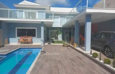 Casa espetacular mobiliada com piscina em condomínio fechado com 5 suítes
