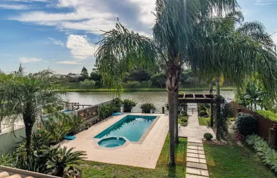 Casa de condomínio à venda em porto alegre, belém novo, com 4 quartos, 387m²