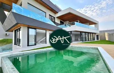 Casa com 5 dormitórios à venda, 600 m² por r$ 7.000.000,00 - condomínio reserva do paratehy - são josé dos campos/sp