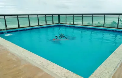 Apartamento 2 dormiórios, suite, churrasqueira, piscina á 100mts da praia - r$ 320 mil