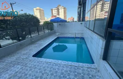 395mil apartamento amplo próximo ao mar da ocian sacada com churrasqueira sol da manha elevador lazer