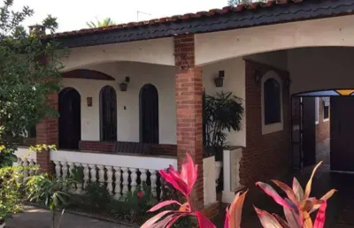 Casa com 4 quartos para alugar na Rua Caiçara, 391, Vila Caiçara, Praia Grande