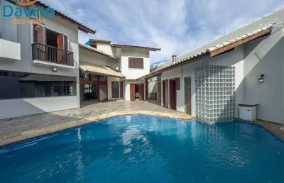 Mansão no canto do forte 5 suites 4 vagas lazer com piscina espaço gourmet com churrasqueira privativos.