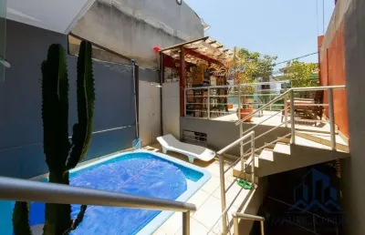 Maravilhosa casa com piscina e área gourmet no jardim vitória.